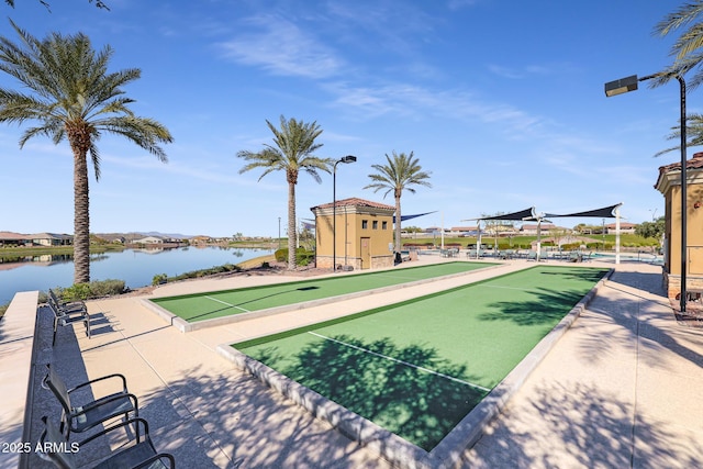 view of home's community with a water view