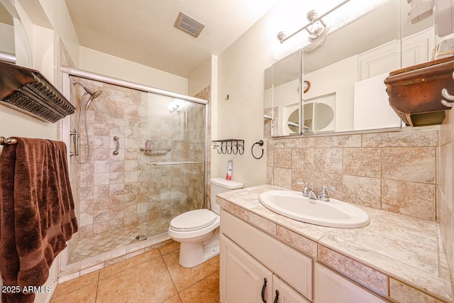 519 N Redondo Dr N, Litchfield Park, AZ 85340 - bathroom with a shower stall, vanity, backsplash, and tile patterned flooring