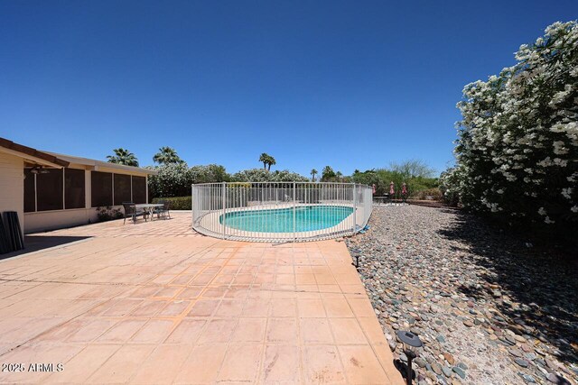 519 N Redondo Dr N, Litchfield Park, AZ 85340 - view of pool with a patio and a sunroom