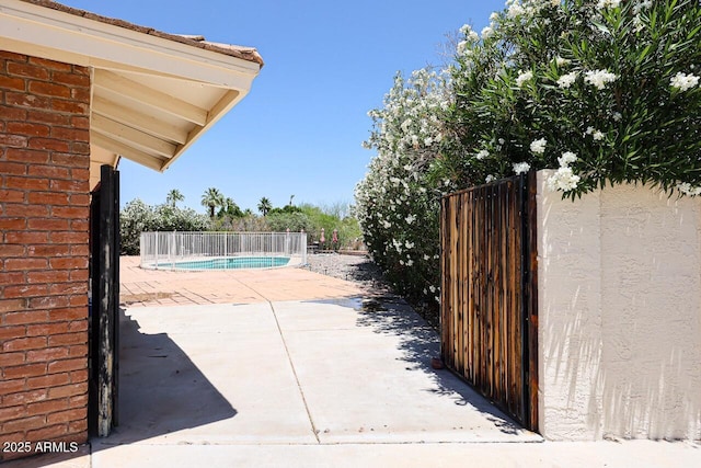 519 N Redondo Dr N, Litchfield Park, AZ 85340 - view of pool featuring a gate