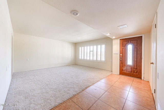 519 N Redondo Dr N, Litchfield Park, AZ 85340 - entrance foyer featuring light colored carpet and light tile patterned floors
