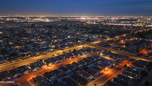 birds eye view of property with a view of city