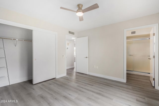 unfurnished bedroom with ceiling fan, a closet, and light hardwood / wood-style flooring