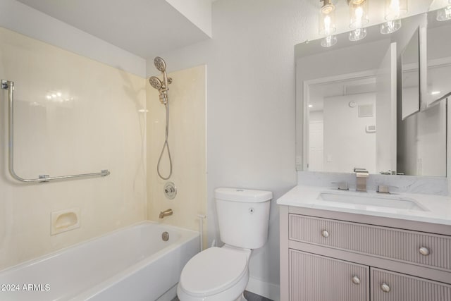 full bathroom featuring bathtub / shower combination, vanity, and toilet