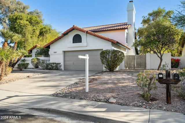 view of front of property featuring a garage