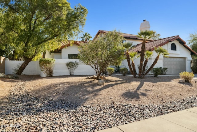 view of front of home featuring a garage