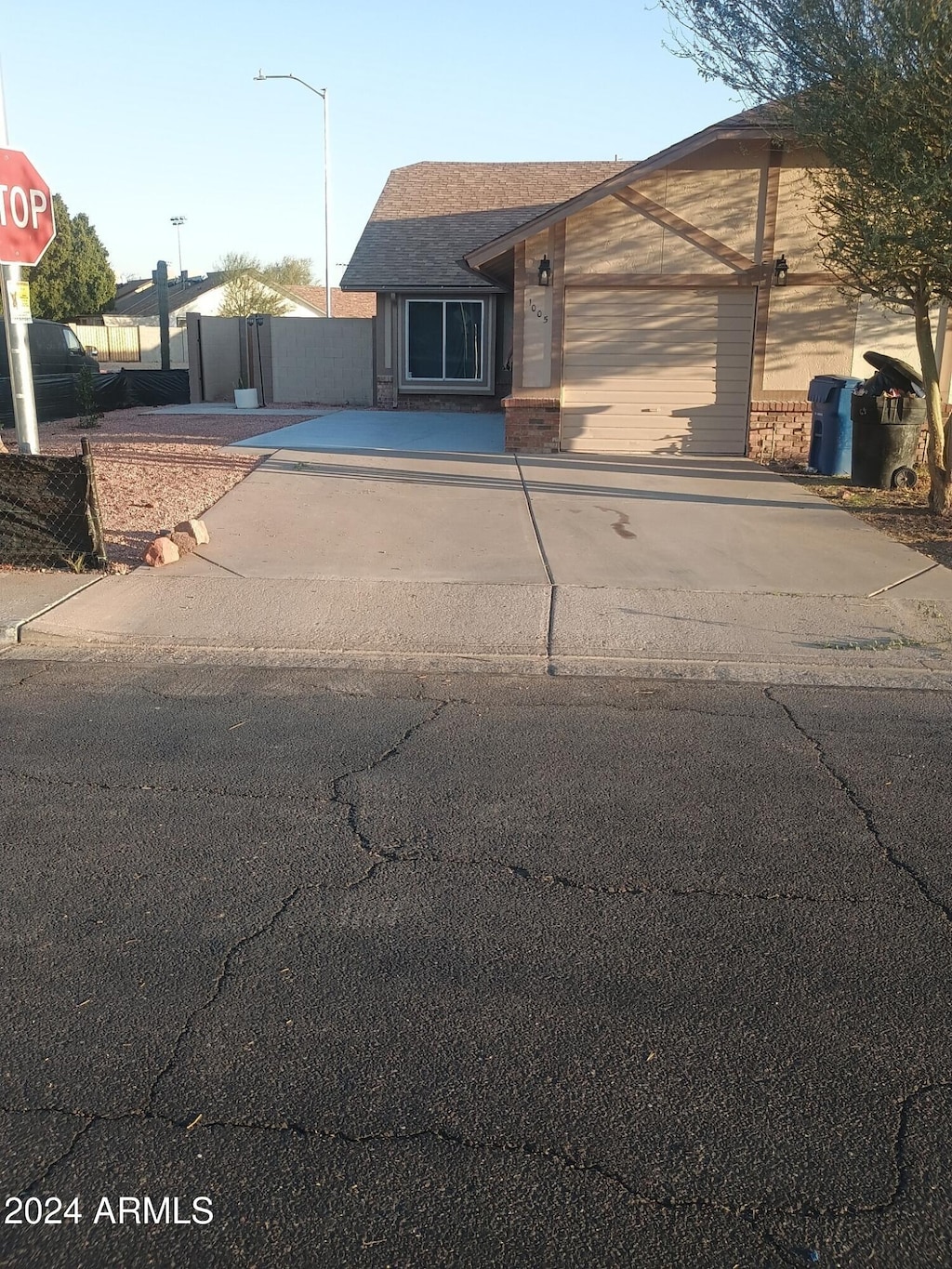 view of front of property featuring a garage