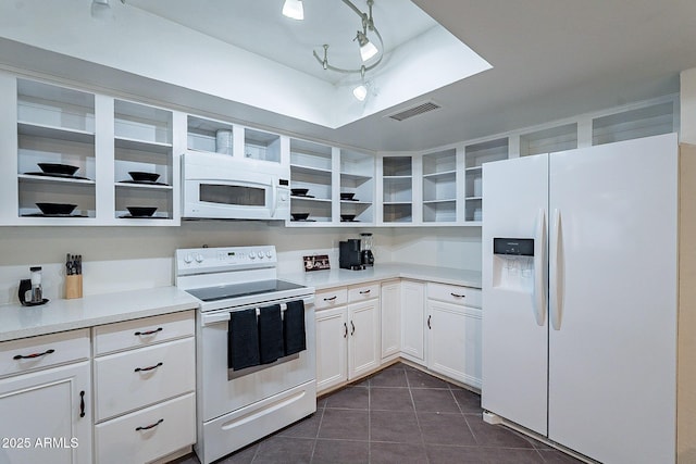 6216 W Poinsettia Dr, Glendale, AZ 85304 - kitchen with white appliances, open shelves, dark tile patterned floors, white cabinets, and light countertops