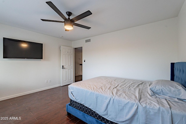 6216 W Poinsettia Dr, Glendale, AZ 85304 - bedroom featuring baseboards, dark wood-type flooring, and a ceiling fan