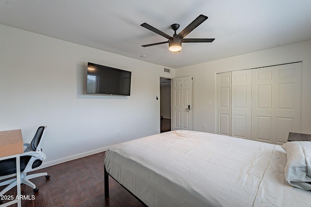 6216 W Poinsettia Dr, Glendale, AZ 85304 - bedroom featuring dark wood-style flooring, baseboards, a closet, and ceiling fan