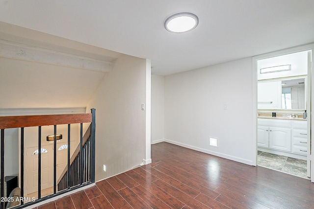 6216 W Poinsettia Dr, Glendale, AZ 85304 - unfurnished room featuring wood finished floors and baseboards