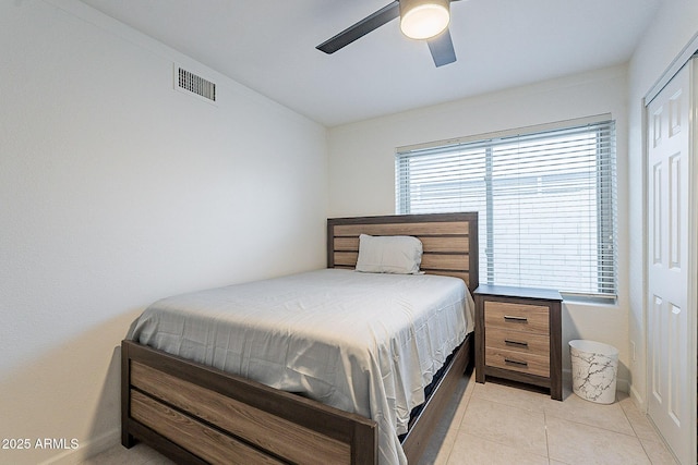 6216 W Poinsettia Dr, Glendale, AZ 85304 - bedroom with light tile patterned floors, a ceiling fan, a closet, and lofted ceiling