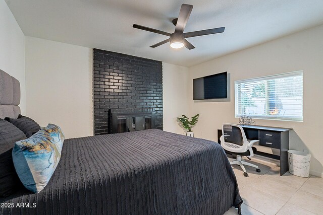 6216 W Poinsettia Dr, Glendale, AZ 85304 - tiled bedroom featuring ceiling fan and a fireplace