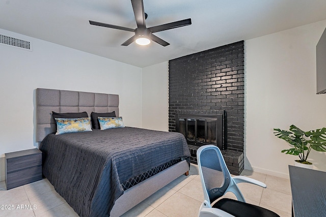 6216 W Poinsettia Dr, Glendale, AZ 85304 - bedroom featuring light tile patterned floors, a fireplace, baseboards, and ceiling fan