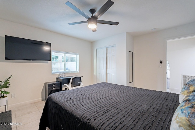 6216 W Poinsettia Dr, Glendale, AZ 85304 - bedroom with a closet, light tile patterned floors, ceiling fan, and baseboards