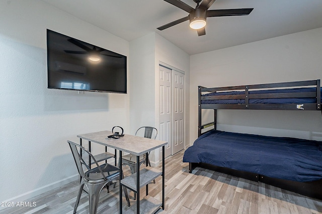 6216 W Poinsettia Dr, Glendale, AZ 85304 - bedroom featuring light wood-style floors, baseboards, a closet, and ceiling fan
