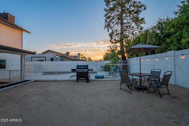 6216 W Poinsettia Dr, Glendale, AZ 85304 - view of patio / terrace featuring fence, area for grilling, and outdoor dining area