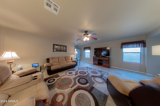 living room featuring ceiling fan