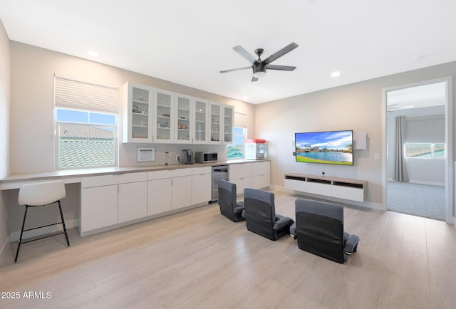 9750 E Radioactive Dr, Mesa, AZ 85212 - living room featuring light wood-style floors, a ceiling fan, recessed lighting, and baseboards