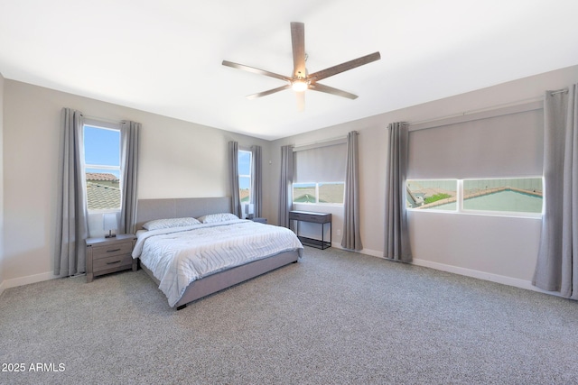 9750 E Radioactive Dr, Mesa, AZ 85212 - bedroom featuring carpet, baseboards, and ceiling fan
