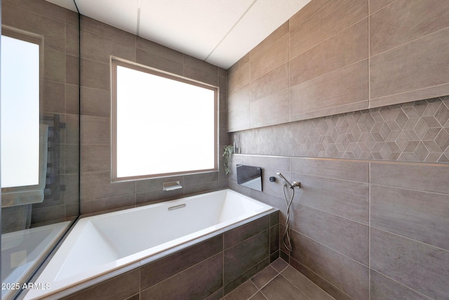 9750 E Radioactive Dr, Mesa, AZ 85212 - full bath with a garden tub, tile walls, and tile patterned floors