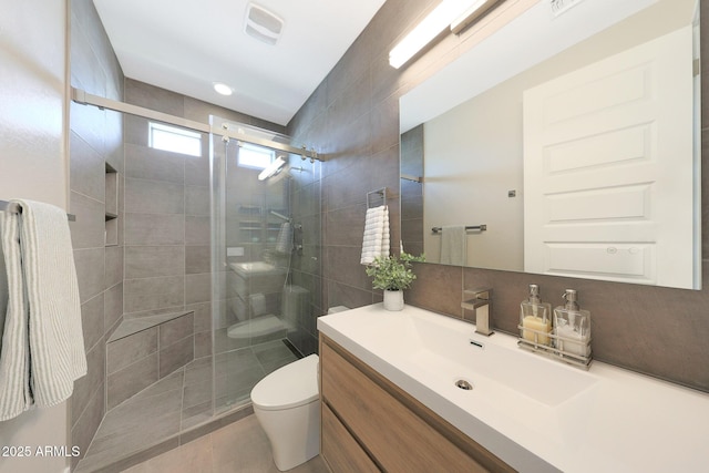 9750 E Radioactive Dr, Mesa, AZ 85212 - bathroom featuring toilet, a stall shower, and vanity