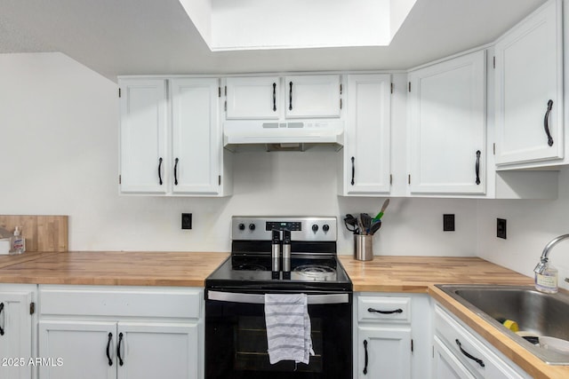 kitchen with white cabinetry, wooden counters, sink, and electric range