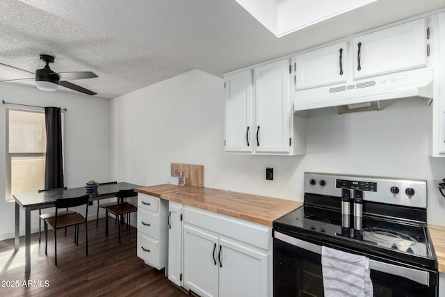 kitchen with white cabinetry, dark hardwood / wood-style floors, wood counters, and stainless steel electric range