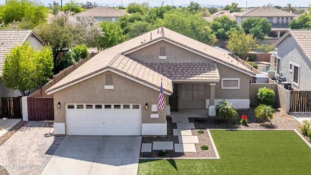 1926 S Longspur Ln, Gilbert, AZ 85295 - view of front of property featuring concrete driveway, stucco siding, and a garage