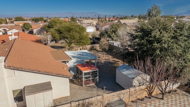 birds eye view of property featuring a mountain view