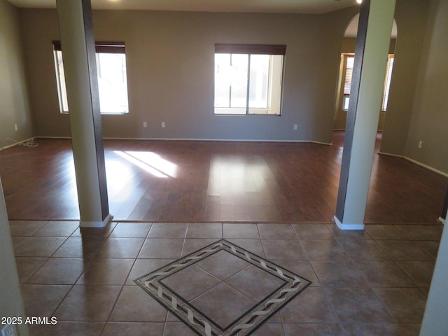 empty room with tile patterned flooring