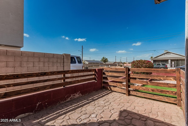 view of patio / terrace with fence