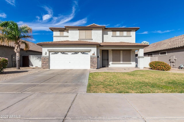 view of front facade with a garage and a front lawn