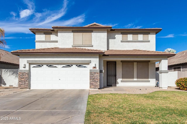 view of front of home with a garage and a front lawn