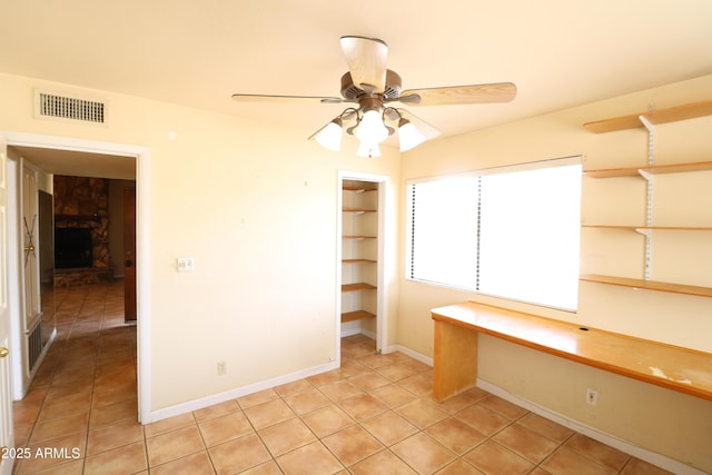 36655 N 25th St, Cave Creek, AZ 85331 - interior space with visible vents, baseboards, ceiling fan, and light tile patterned floors