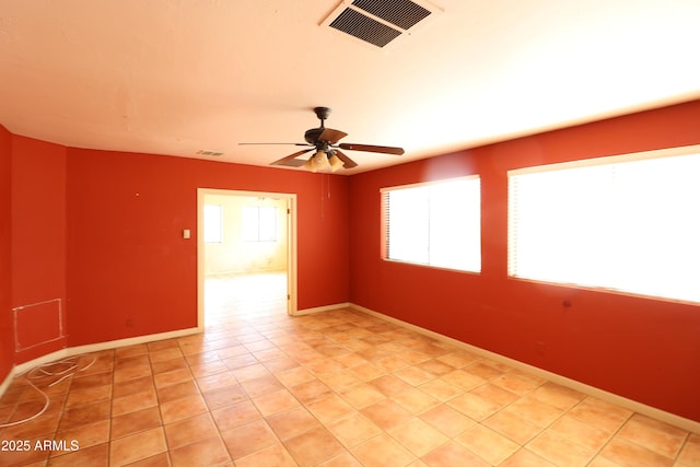 36655 N 25th St, Cave Creek, AZ 85331 - empty room with visible vents, a ceiling fan, baseboards, and light tile patterned floors