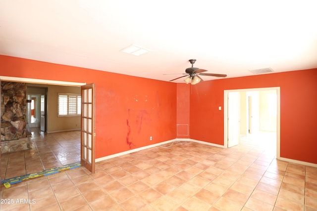 36655 N 25th St, Cave Creek, AZ 85331 - empty room featuring visible vents, a ceiling fan, baseboards, and light tile patterned floors