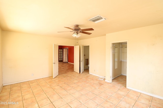 36655 N 25th St, Cave Creek, AZ 85331 - spare room featuring ceiling fan, baseboards, visible vents, and light tile patterned floors