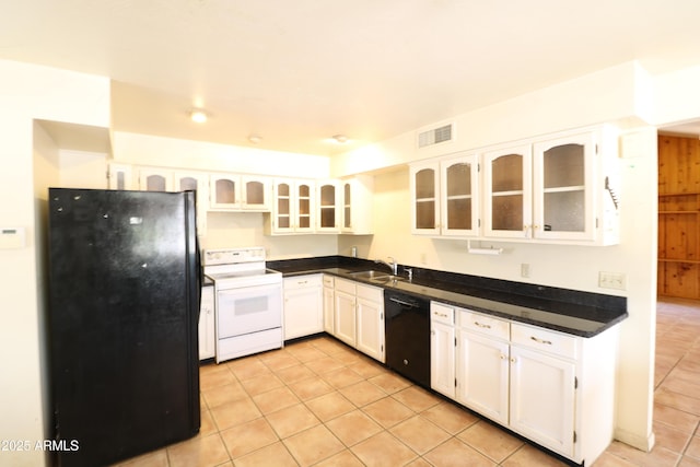 36655 N 25th St, Cave Creek, AZ 85331 - kitchen with visible vents, light tile patterned floors, a sink, black appliances, and white cabinetry