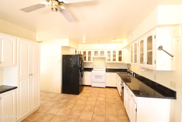 36655 N 25th St, Cave Creek, AZ 85331 - kitchen with a sink, electric range, dark countertops, freestanding refrigerator, and ceiling fan