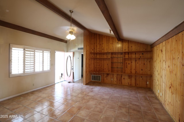 36655 N 25th St, Cave Creek, AZ 85331 - empty room with lofted ceiling with beams, baseboards, wood walls, tile patterned flooring, and visible vents