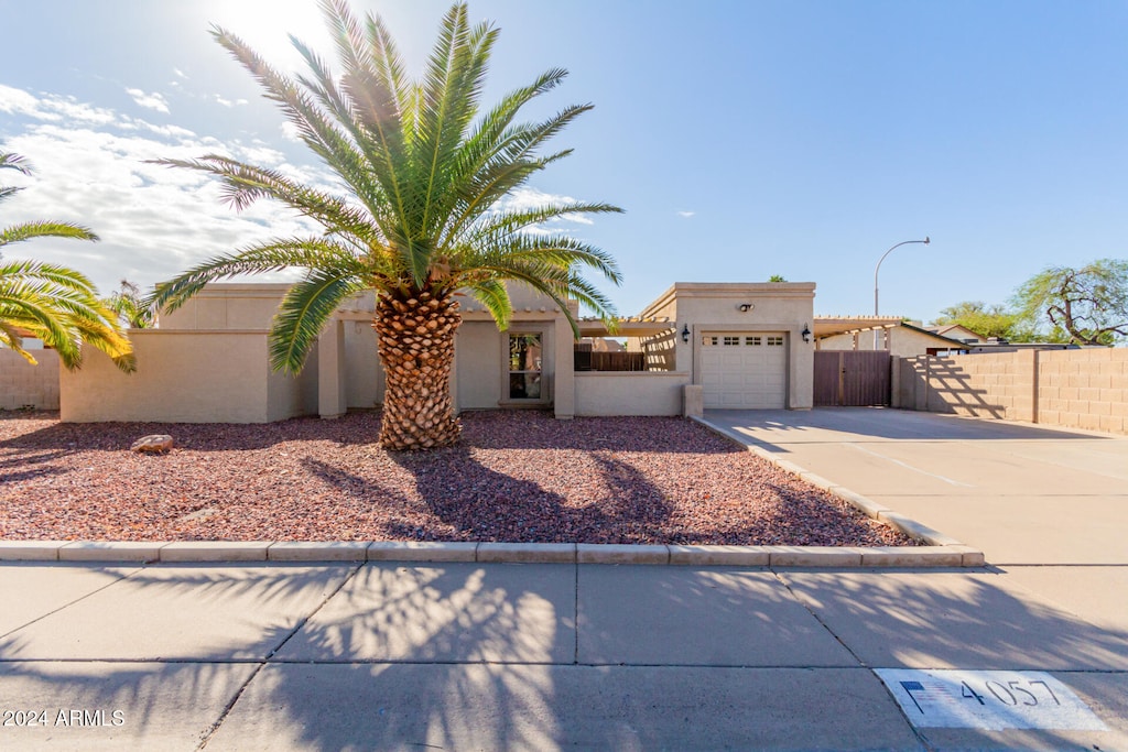 view of front of property with a garage