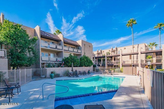 view of pool with a patio area