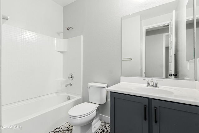 full bathroom with vanity, bathtub / shower combination, and toilet