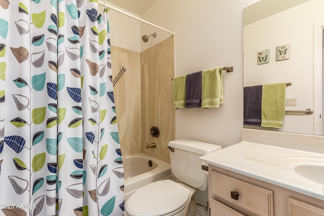 full bathroom with vanity, shower / tub combo with curtain, and toilet