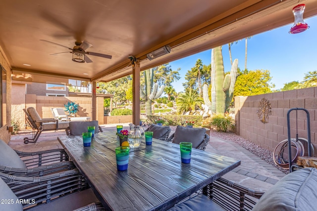 view of patio featuring outdoor lounge area and ceiling fan