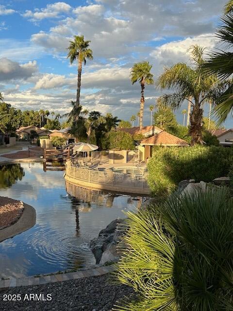 view of home's community featuring a water view