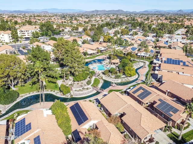 birds eye view of property featuring a mountain view