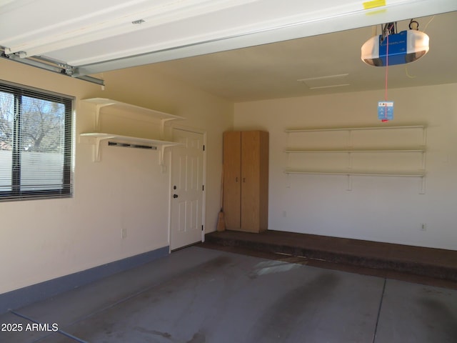 garage featuring a garage door opener