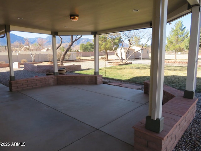 view of patio / terrace featuring a mountain view